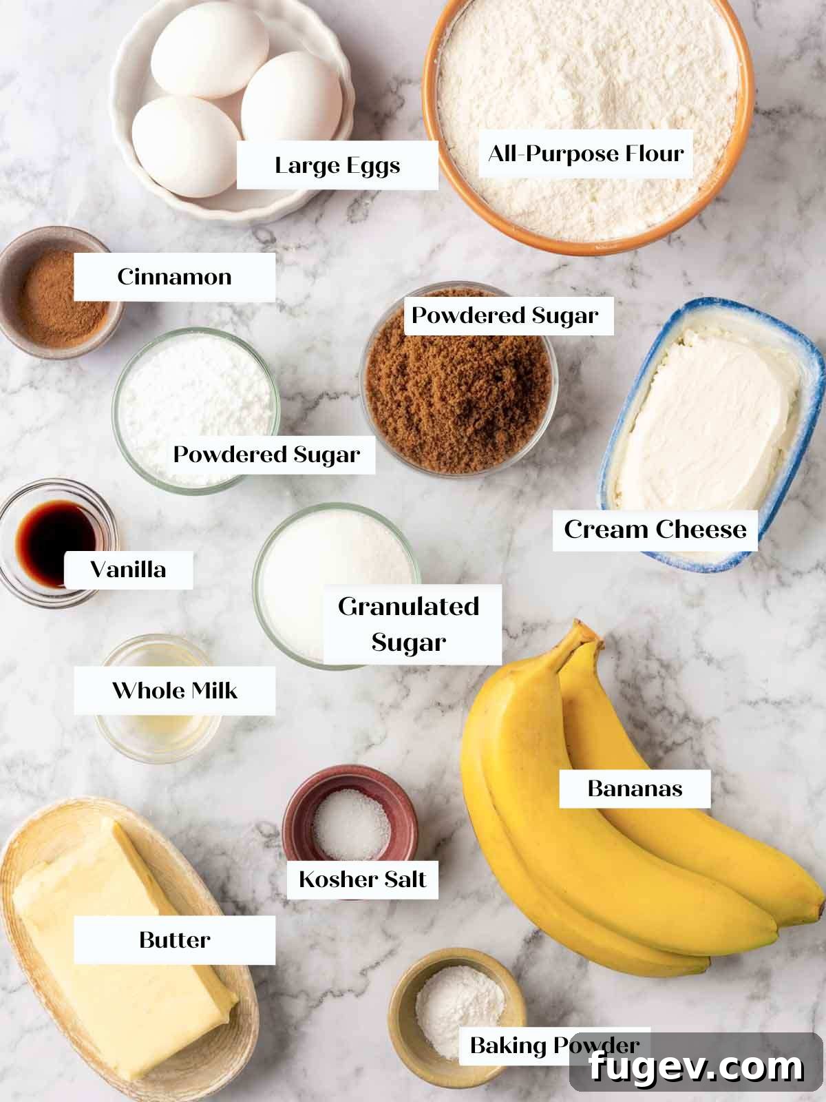 Luscious Banana Cake with Tangy Cream Cheese Frosting 3 A flat lay of fresh ingredients laid out for baking a banana cake, including ripe bananas, flour, sugar, and spices, ready for preparation.