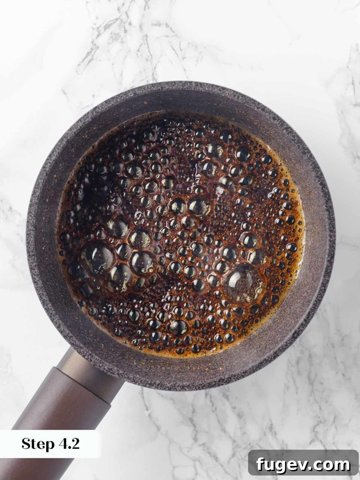 Silky Caramel Custard 8 Golden caramelized sugar bubbling in a pan, illustrating the perfect stage for pouring into ramekins.