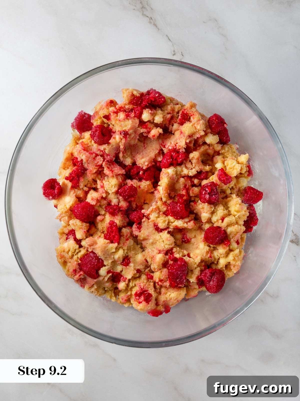 Velvet White Chocolate Raspberry Cookies 13 The perfect consistency of cookie dough with frozen raspberries gently folded in, creating beautiful streaks of color without disintegrating the berries.