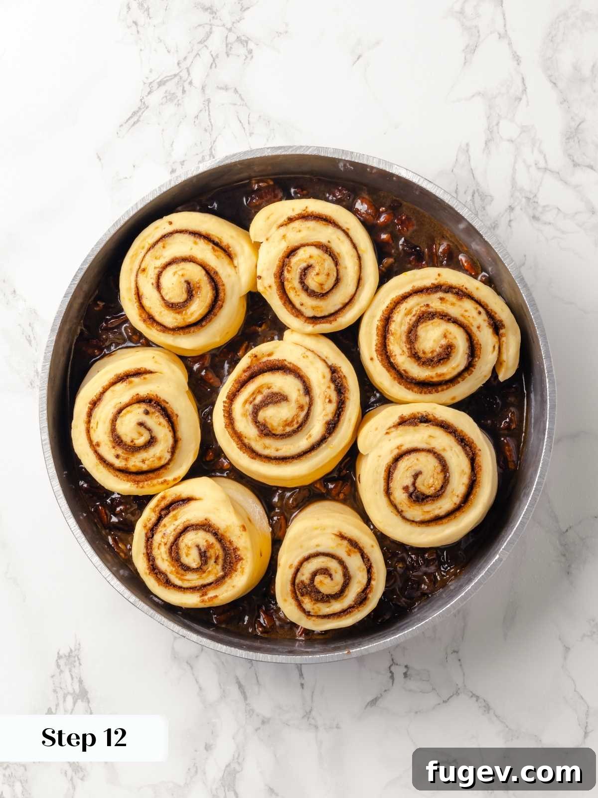 Gooey Pecan Caramel Rolls 22 Sticky buns in the pan after proofing, ready to bake.