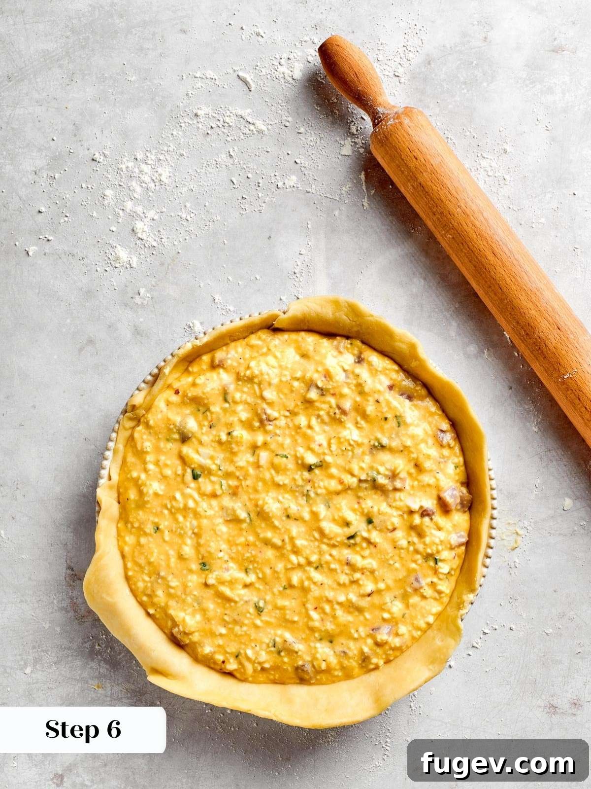 Rustic Italian Easter Pie 12 A springform pan, carefully lined with pastry dough and generously filled with the savory ingredients of pizza rustica.