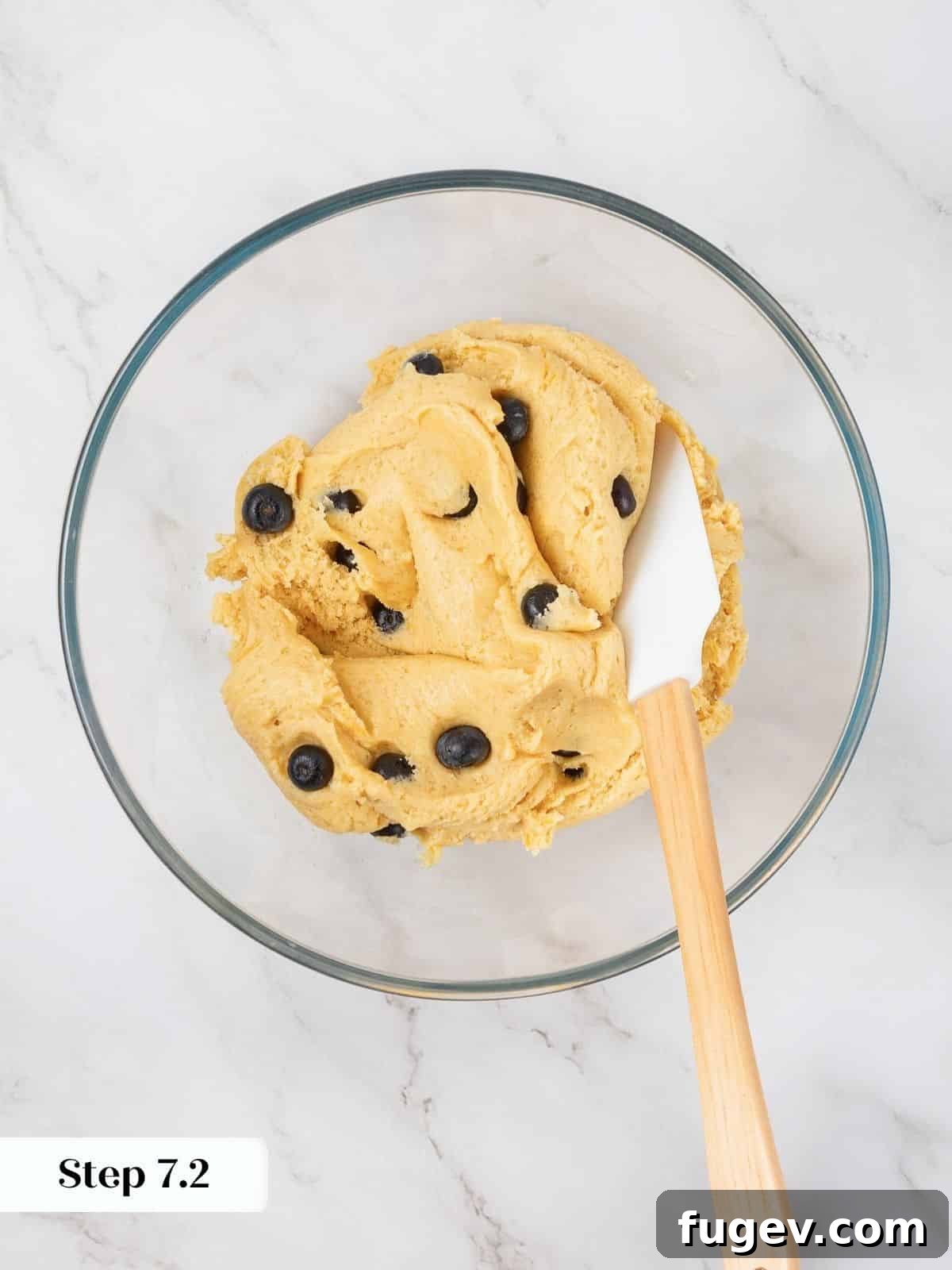 Bright Lemon Blueberry Delights 14 Cookie dough fully mixed with whole blueberries evenly distributed, showcasing the dough's texture.