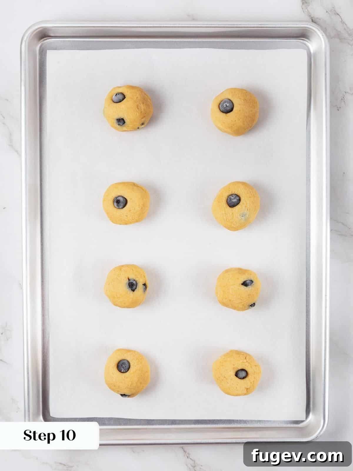 Bright Lemon Blueberry Delights 17 A tray of perfectly chilled lemon blueberry cookie dough balls, spaced and ready for the oven.