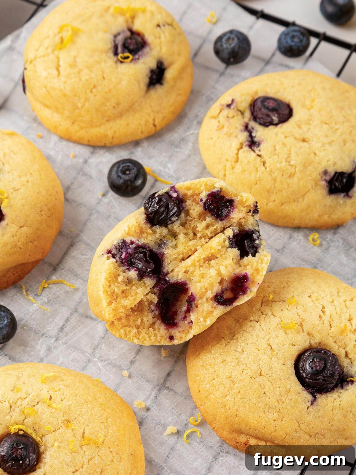 Bright Lemon Blueberry Delights 20 The interior of a perfectly baked, chewy lemon blueberry cookie, showcasing fresh, juicy berries and a tender crumb.