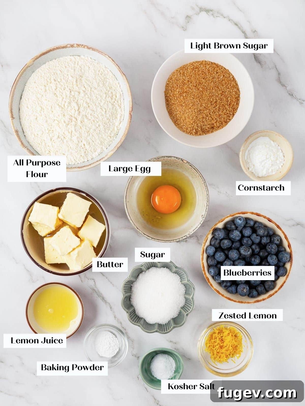 Bright Lemon Blueberry Delights 4 All ingredients for lemon blueberry cookies arranged neatly on a kitchen counter.