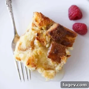 Lemon Raspberry Bread Pudding slice white plate fresh raspberries