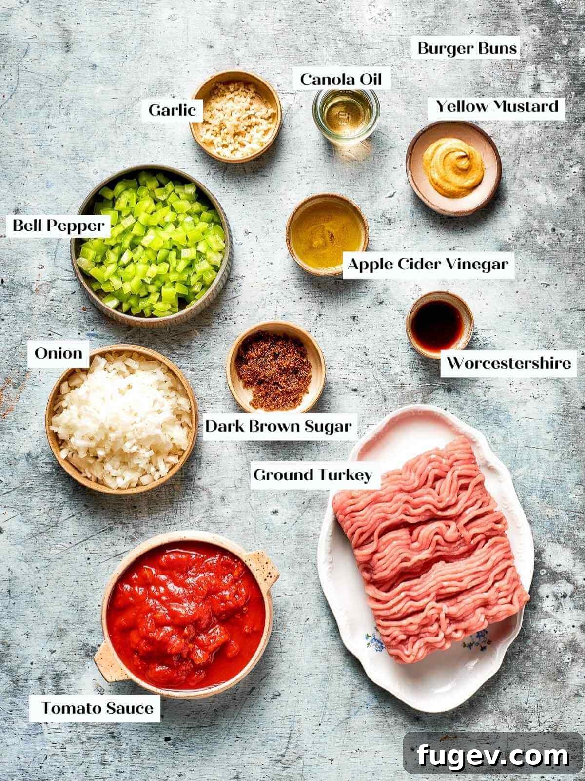 Homestyle Turkey Sloppy Joes 3 All the fresh and pantry ingredients for making turkey sloppy joes neatly arranged on a kitchen countertop.