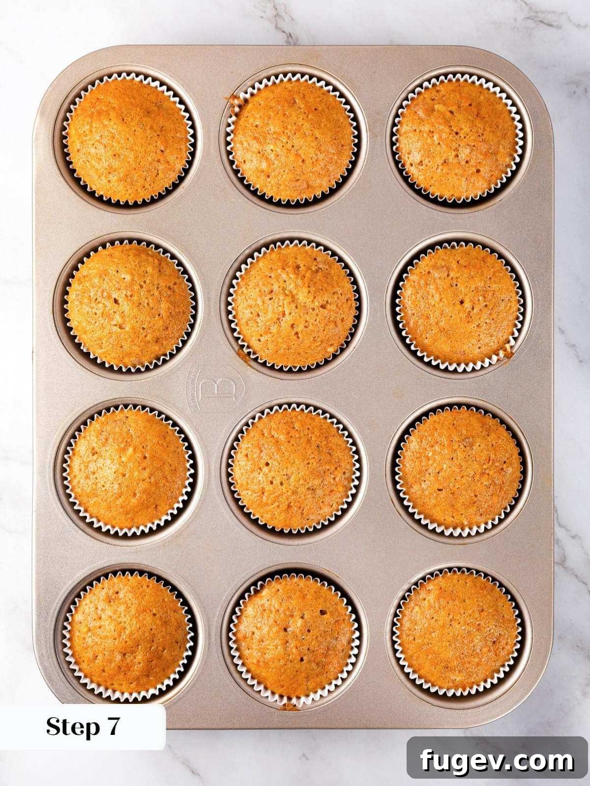 Decadent Carrot Cake Cupcakes 15 Adding powdered sugar to the creamed mixture.