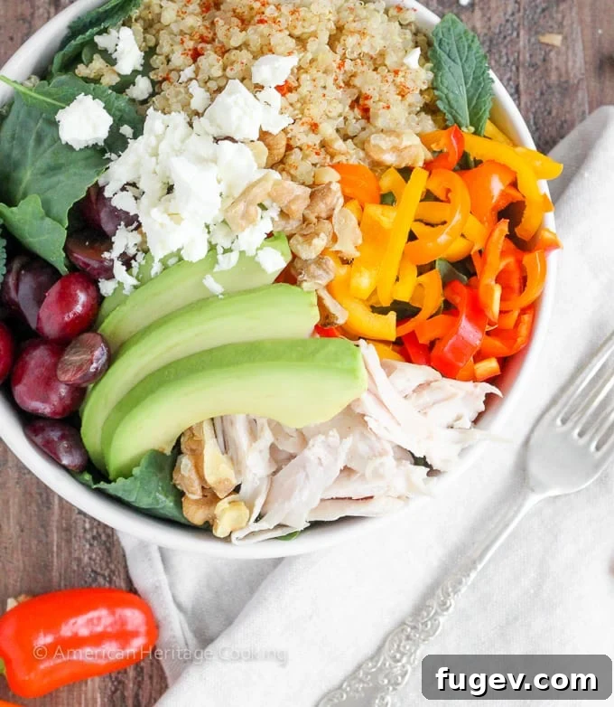 Emerald Energy Quinoa Bowl 2 A colorful and nutritious Quinoa Kale Power Bowl, featuring roasted chicken, vibrant vegetables, and a creamy dressing. Perfect for a healthy lunch or dinner.