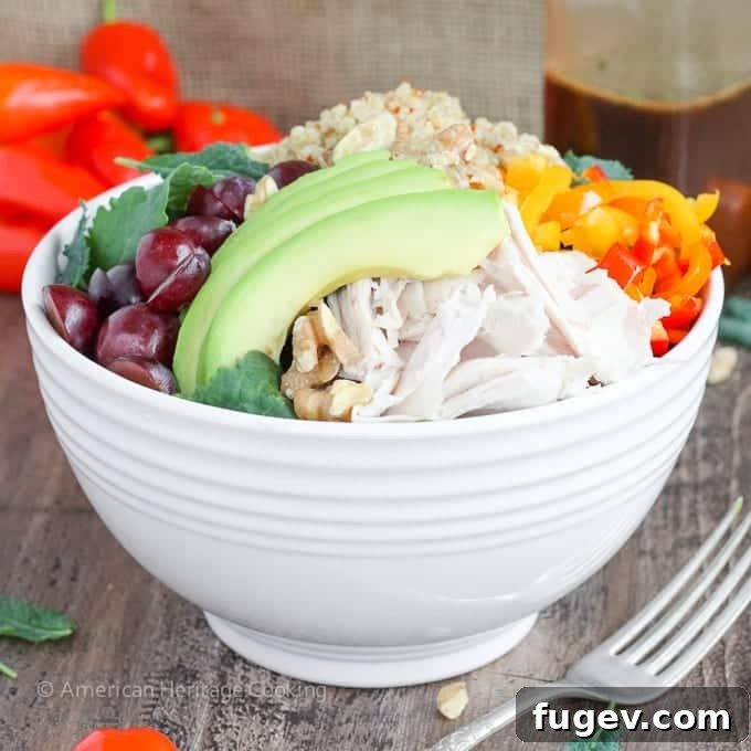 Emerald Energy Quinoa Bowl 7 A serving of the Quinoa Kale Power Bowl, highlighting the texture and variety of ingredients, along with the dressing.