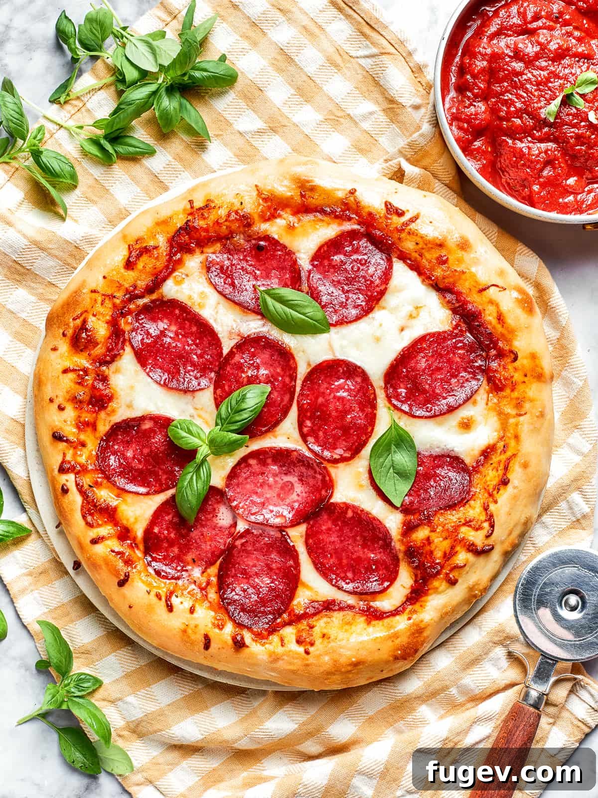 Zesty Pepperoni Delight 10 Overhead view of a complete pizza with golden crust and bubbling cheese.