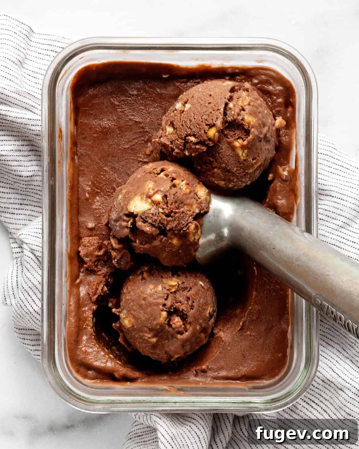 Salted Peanut Chocolate Ice Cream Bliss 3 Chocolate nice cream being scooped from a container.