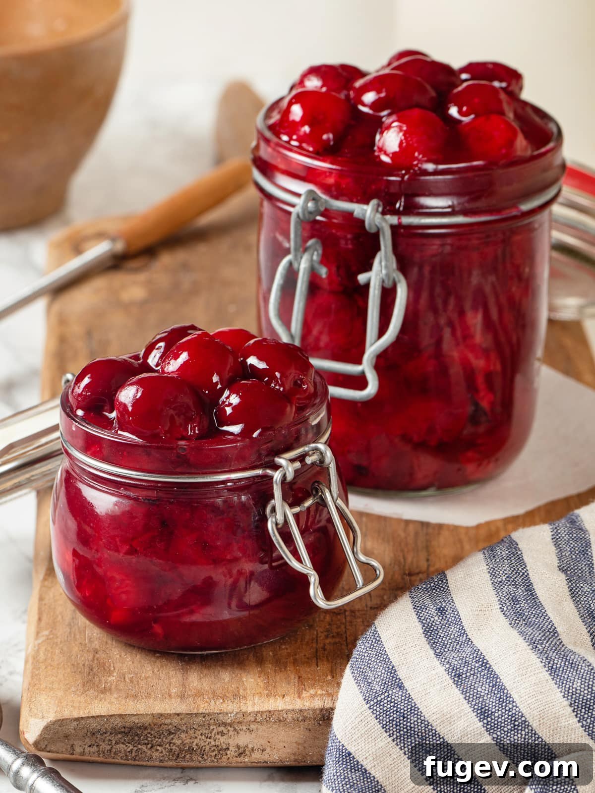 Homemade Cherry Pie Filling Perfection 9 Finished pie filling glows bright red with plump cherries suspended in thick syrup, showcasing its perfect consistency.