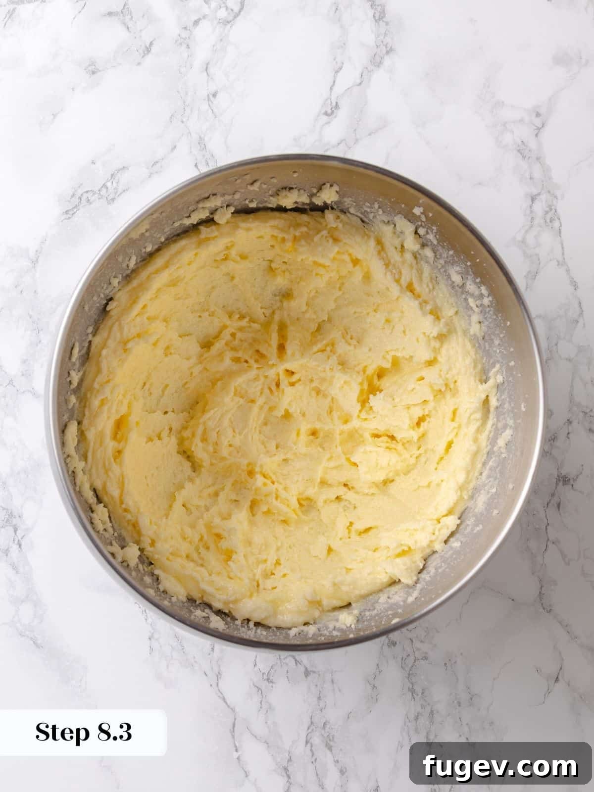 Melted Butter Dream 15 The egg is thoroughly mixed into the creamed butter and sugar, creating a cohesive and slightly lighter topping batter.