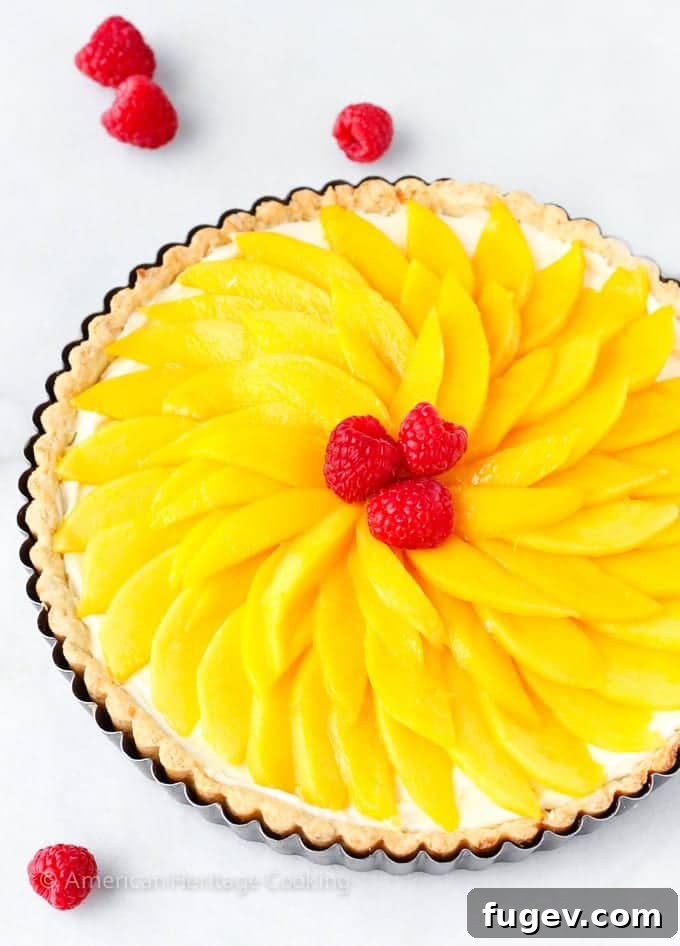 Tropical Mango Coconut Dream 2 A vibrant Coconut Mango Tart topped with fresh mango slices, perfect for summer entertaining.