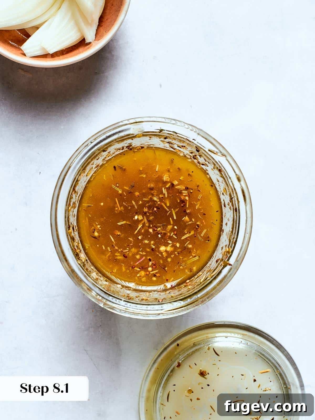 Vibrant Tuscan Kale Delight 12 Clear jar filled with mixed dressing ready to pour over fresh Tuscan kale salad, showing its emulsified texture.