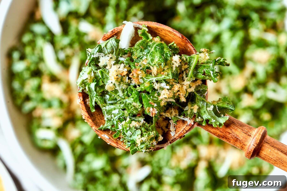 Vibrant Tuscan Kale Delight 6 Sliced onion pieces visible throughout Tuscan kale salad with tender kale ribbons and golden breadcrumbs.