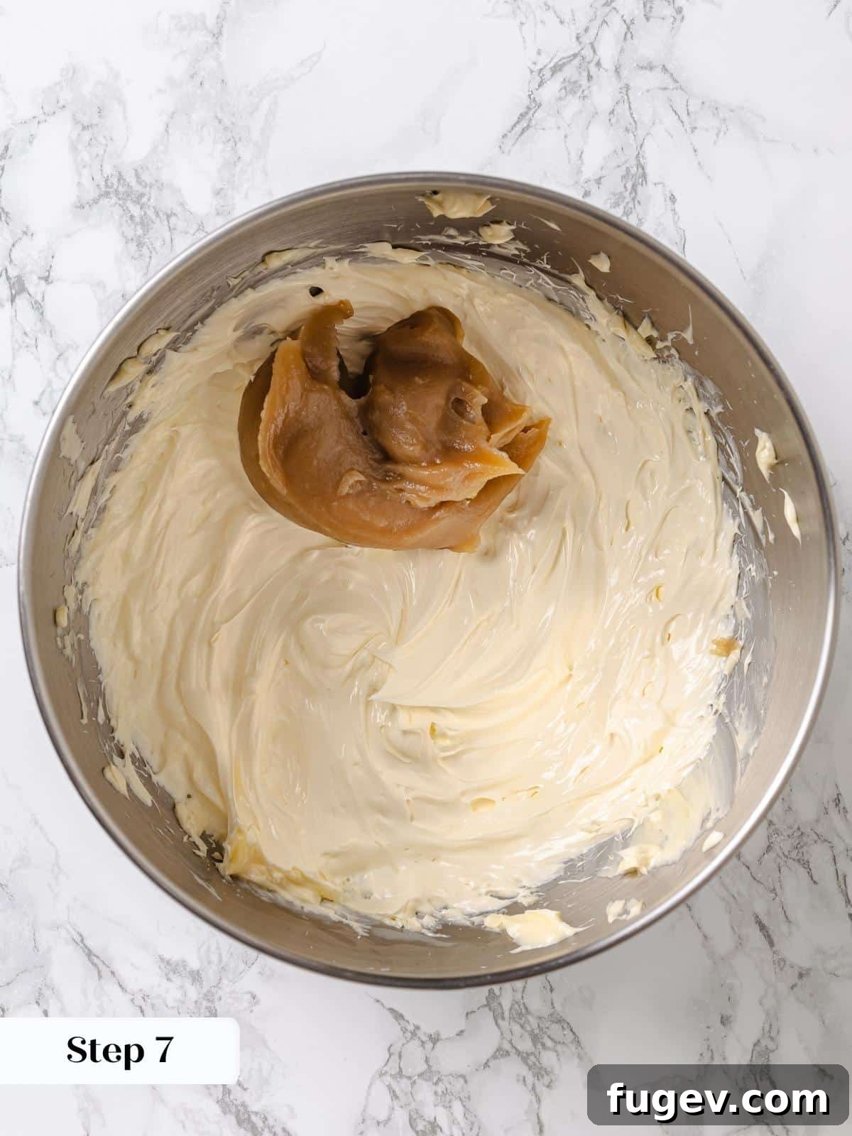 Golden Maple Delight 11 Gradual addition of the cooled maple flour mixture to the whipped butter in a stand mixer.