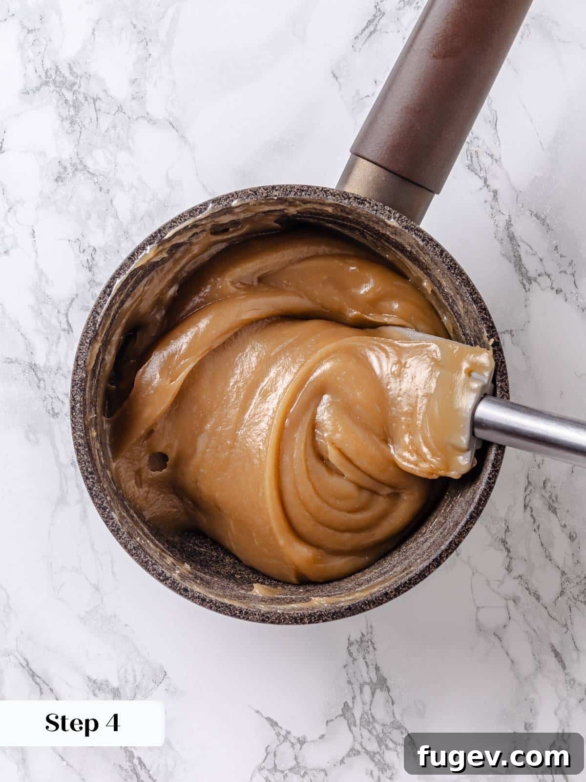 Golden Maple Delight 9 Thickened maple frosting base, showing its consistency when stirred in the saucepan.