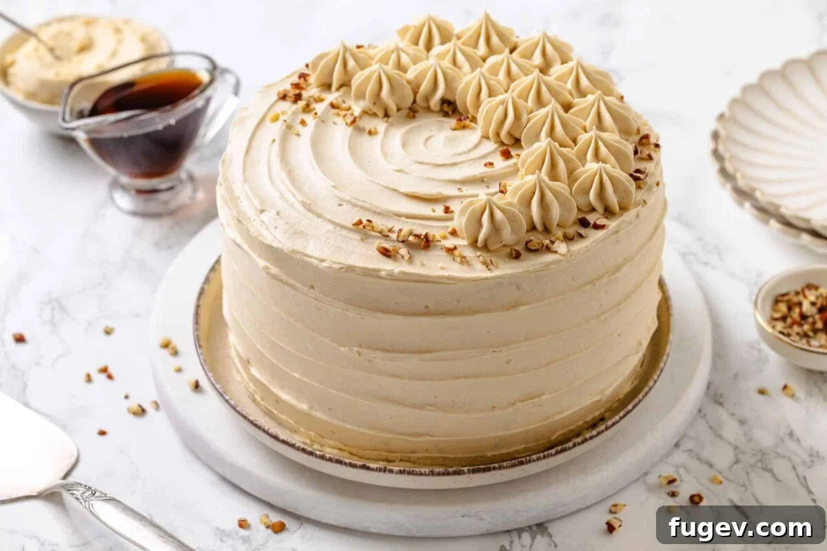 Golden Maple Temptation 4 Beautifully frosted maple cake, whole and unsliced, ready to be served.