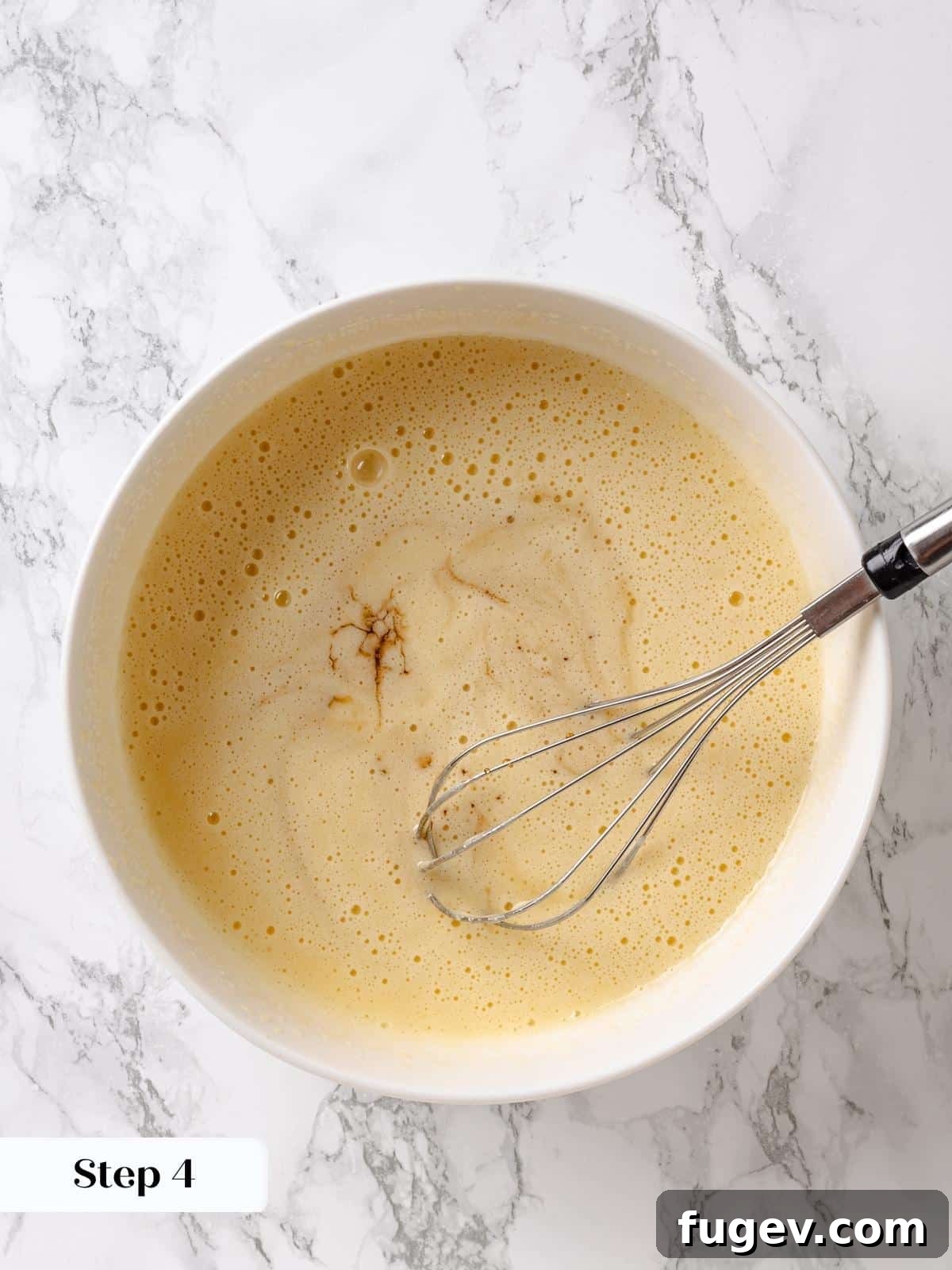Golden Maple Temptation 8 Maple syrup carefully added into the wet ingredients mixture for the maple cake batter.