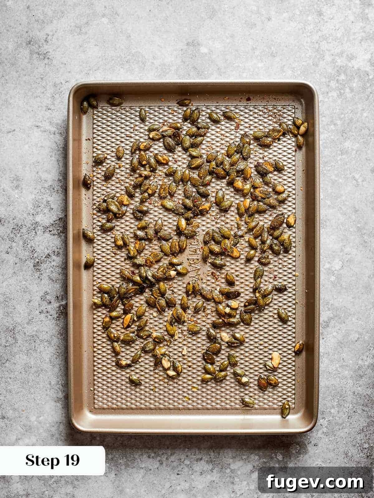 Golden Harvest Squash Soup 13 Pepitas roasting on parchment-lined tray until golden brown and fragrant.