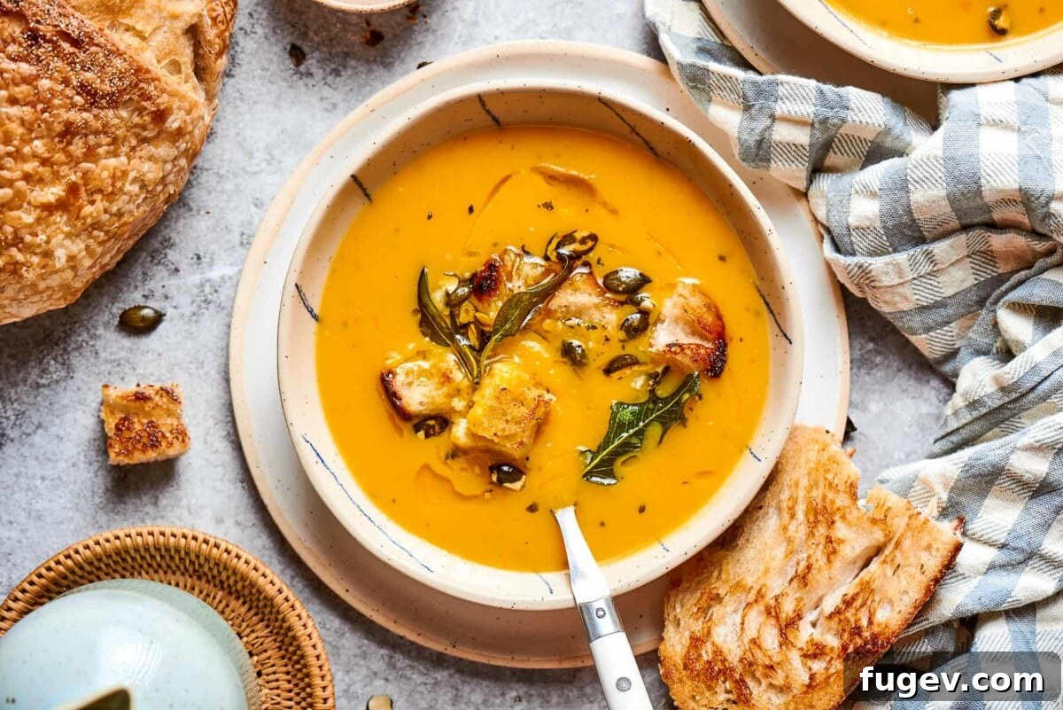 Golden Harvest Squash Soup 4 Bowl of deep orange squash soup highlighting rich roasted color.