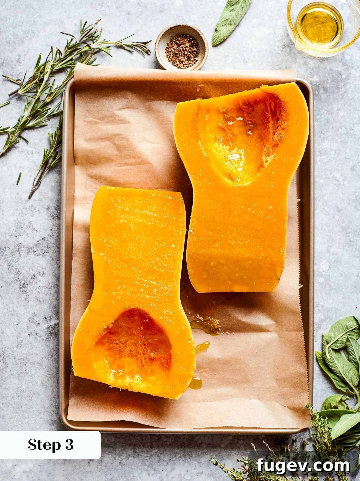 Golden Harvest Squash Soup 5 Butternut squash cut in half with seeds scooped out, prepped for roasting.