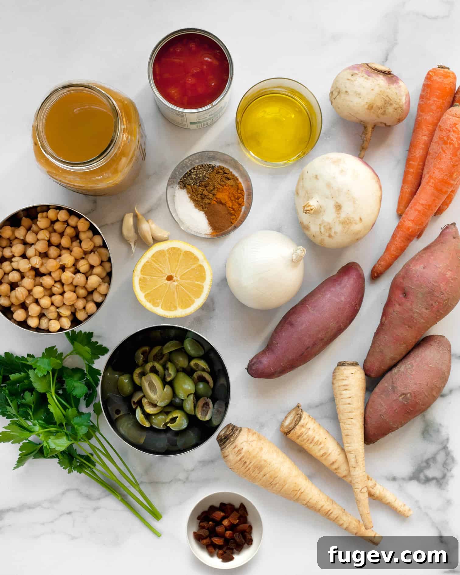 Spiced Root Vegetable Tagine 4 Ingredients including root vegetables, olive oil, spices, garlic, parsley, chickpeas, olives and dried apricots
