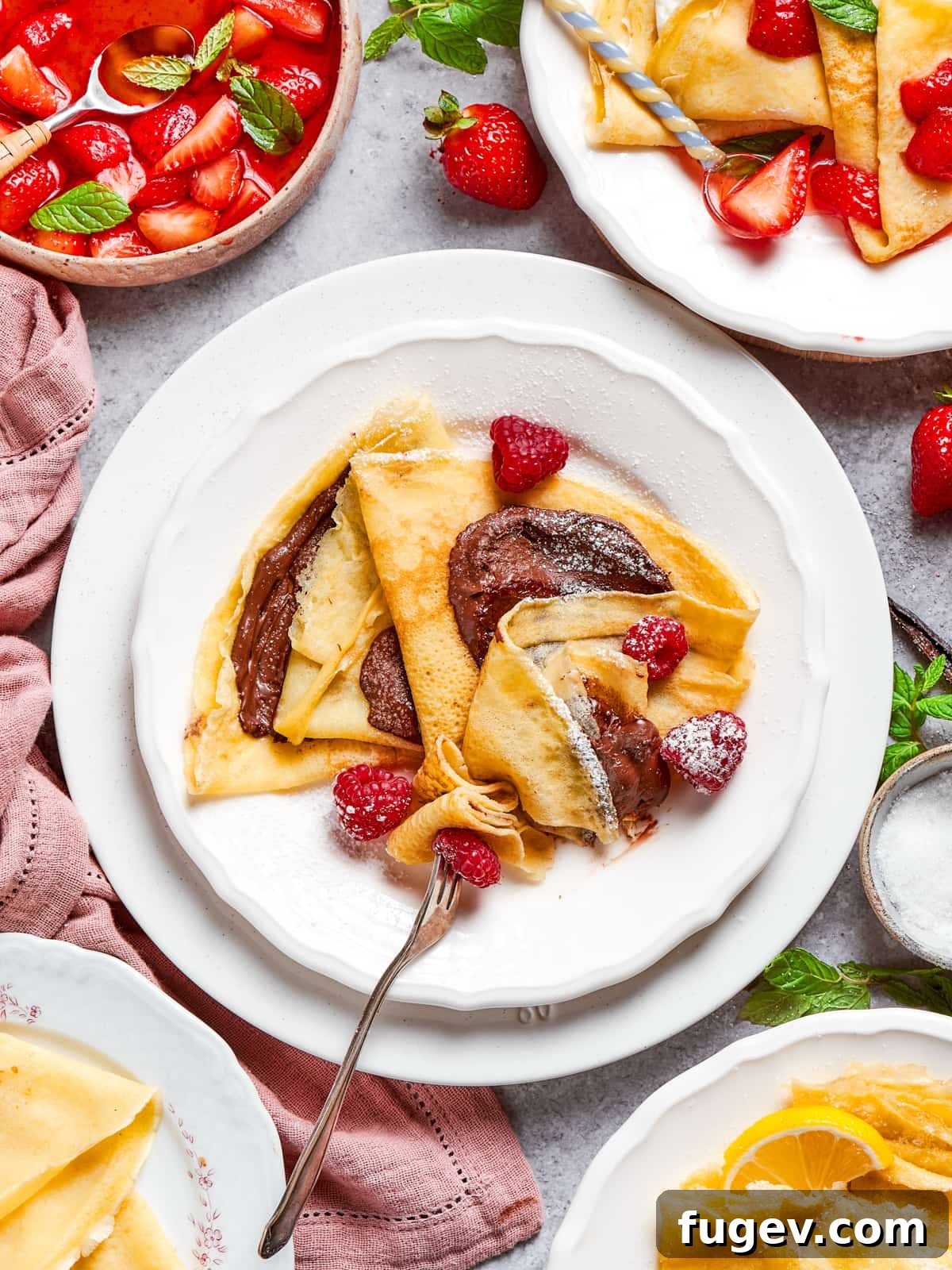 Easy Sweet Crepe Perfection 14 A stack of beautifully golden-brown crepes ready for serving, showcasing their delicate texture and inviting warmth.