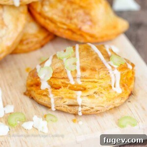 The Buffalo Chicken Blue Cheese Hand Pies will be a HUGE hit at your next party! All the flavors of Buffalo Chicken Wings in a flakey, all-butter pastry!