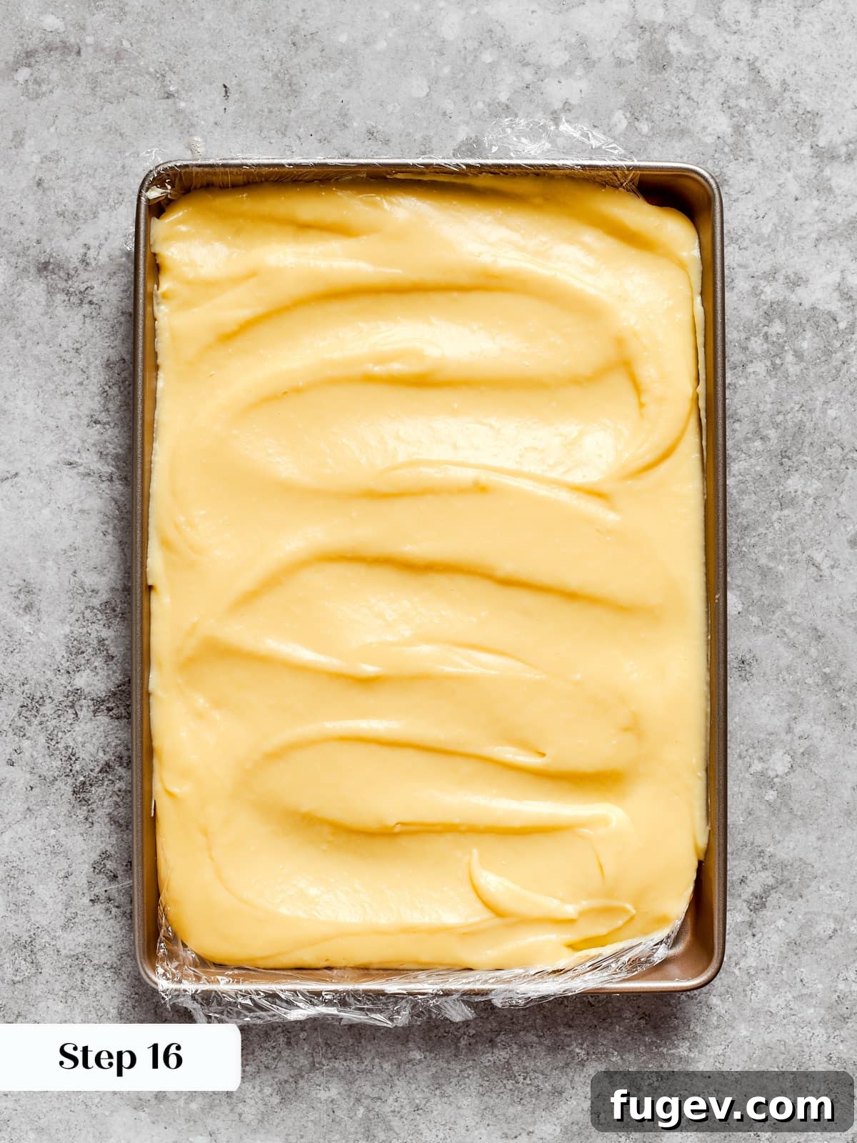 Silken Layered Crepe Delight 13 Warm custard leveled on a sheet so it can chill and firm for later use.