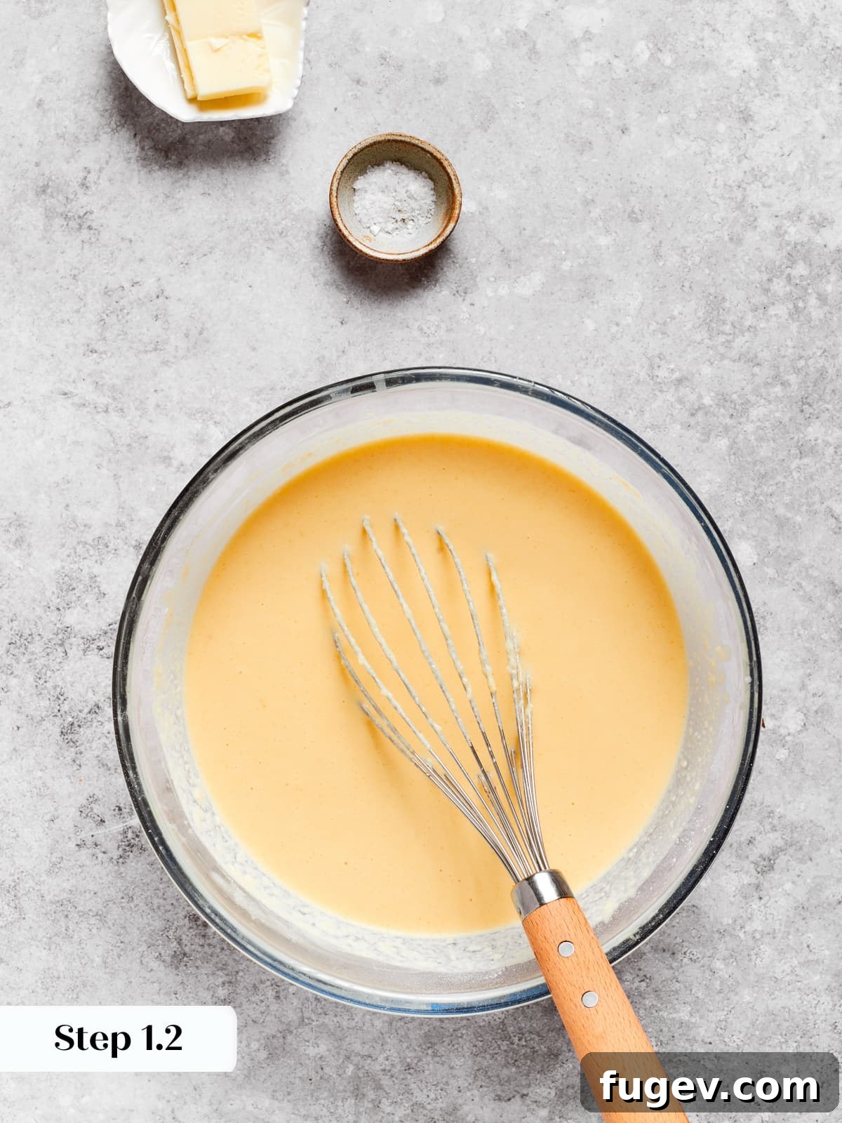 Silken Layered Crepe Delight 7 Freshly mixed crepe batter sitting in a bowl with a smooth texture ready for cooking.