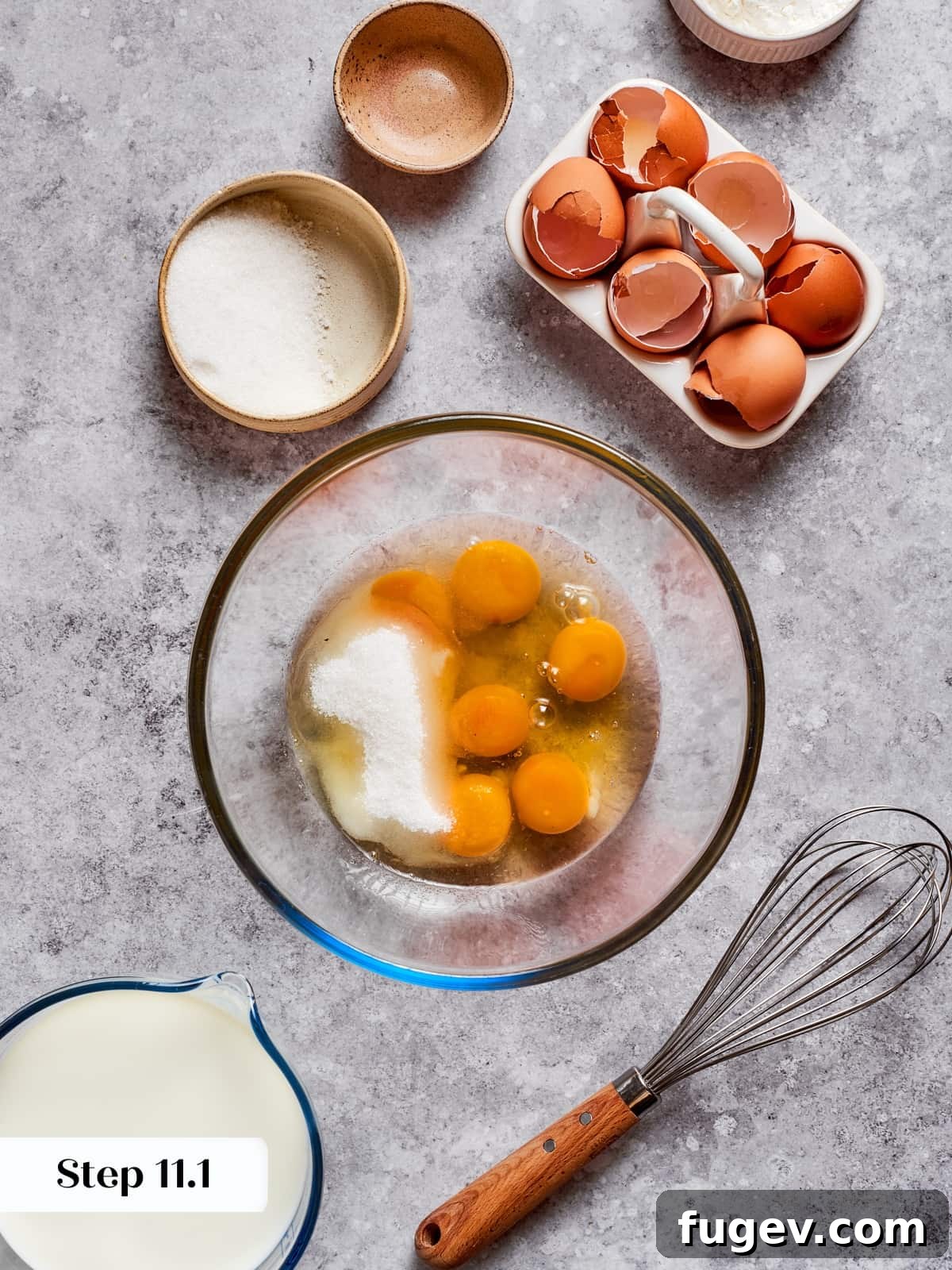 Silken Layered Crepe Delight 10 Ingredients for the pastry cream being whisked into a smooth mixture in a bowl.
