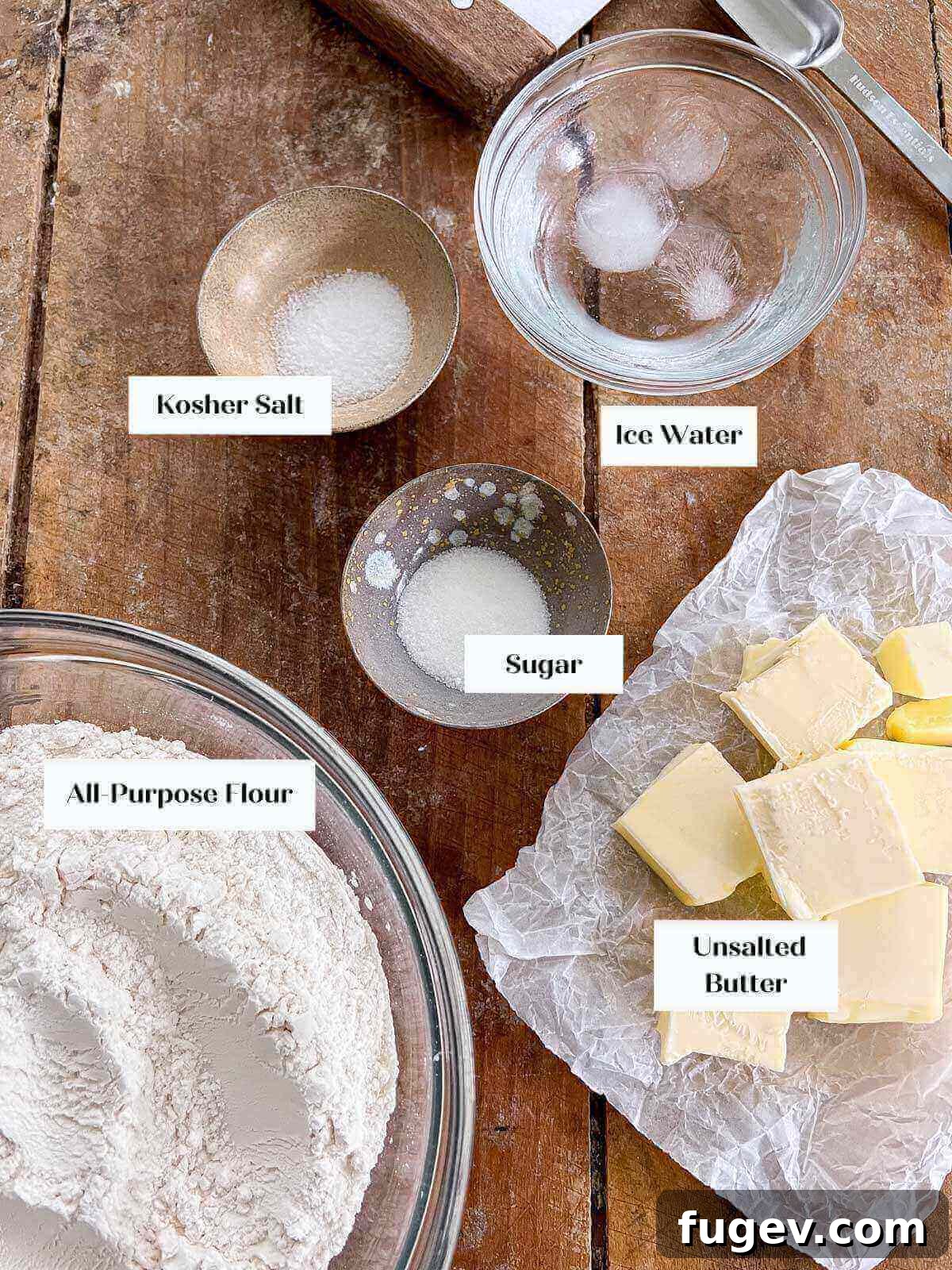 Rich Flaky Butter Pastry 3 All butter pie crust ingredients laid out on a wooden board.