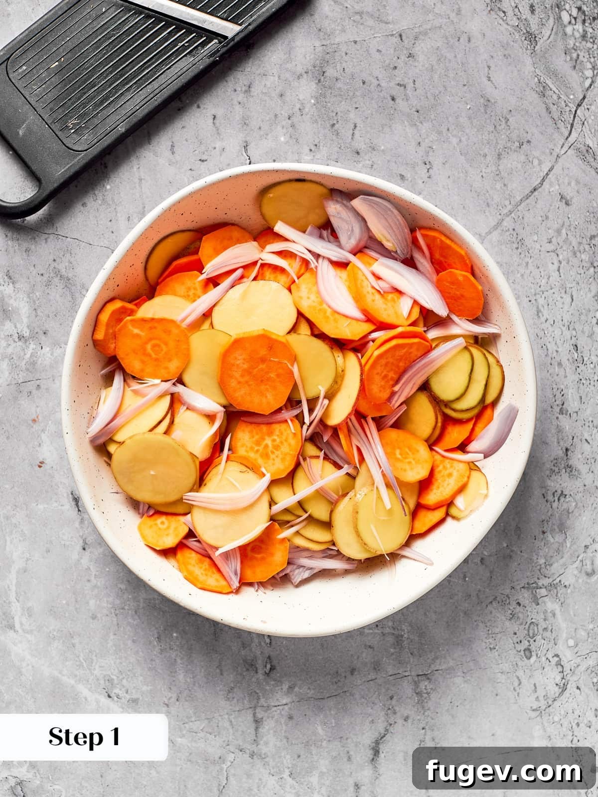 Effortless Scalloped Potato Perfection 6 Thin potato and shallot slices prepared using a mandoline slicer.
