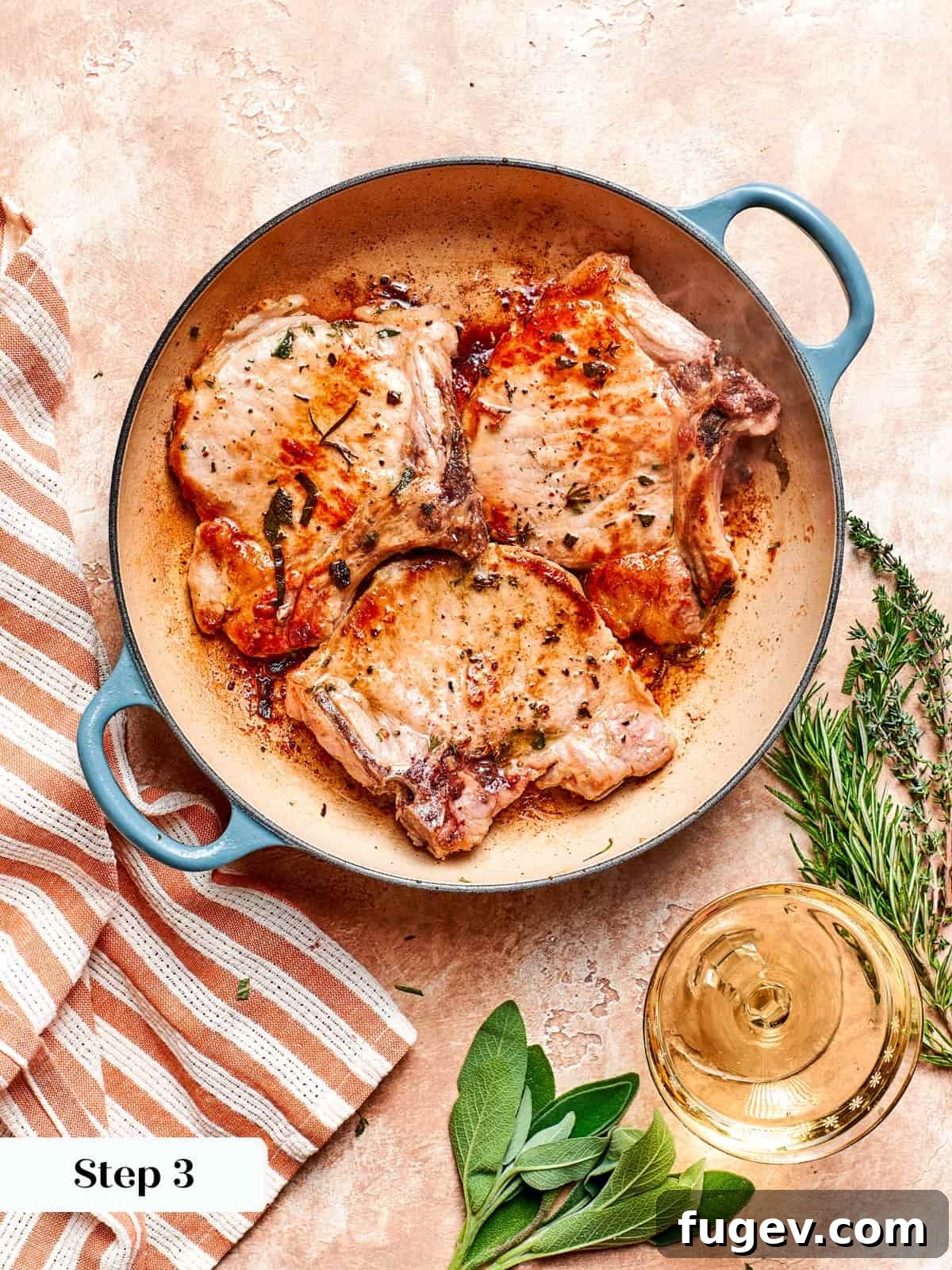 Succulent Pork with Warm Apple Compote 9 Perfectly pan-seared pork chops, cooked through and boasting a rich golden crust, ready to be sauced and served.