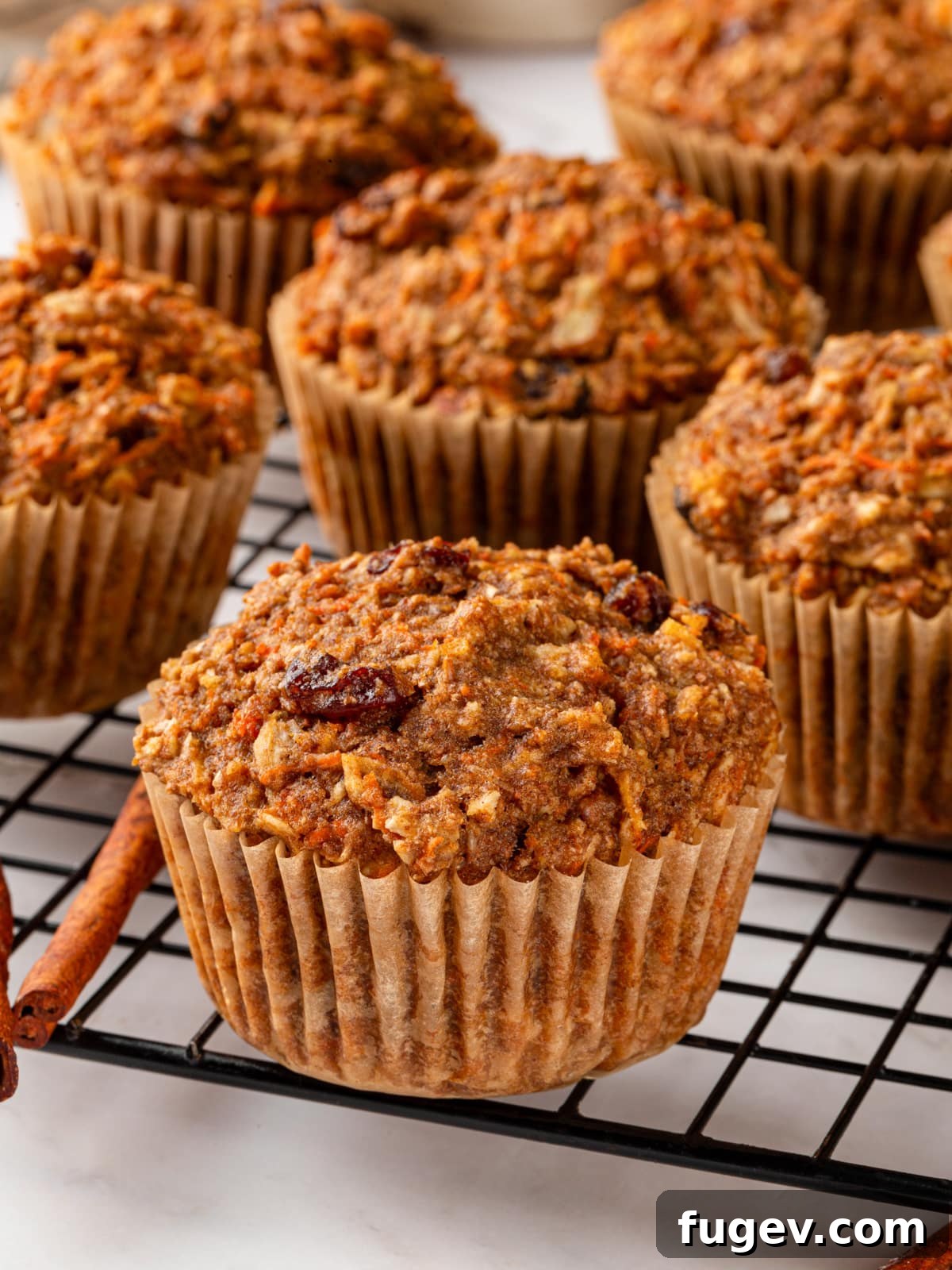 Morning Glow Muffins 14 Simple presentation of freshly baked morning glory muffins cooling after the oven.
