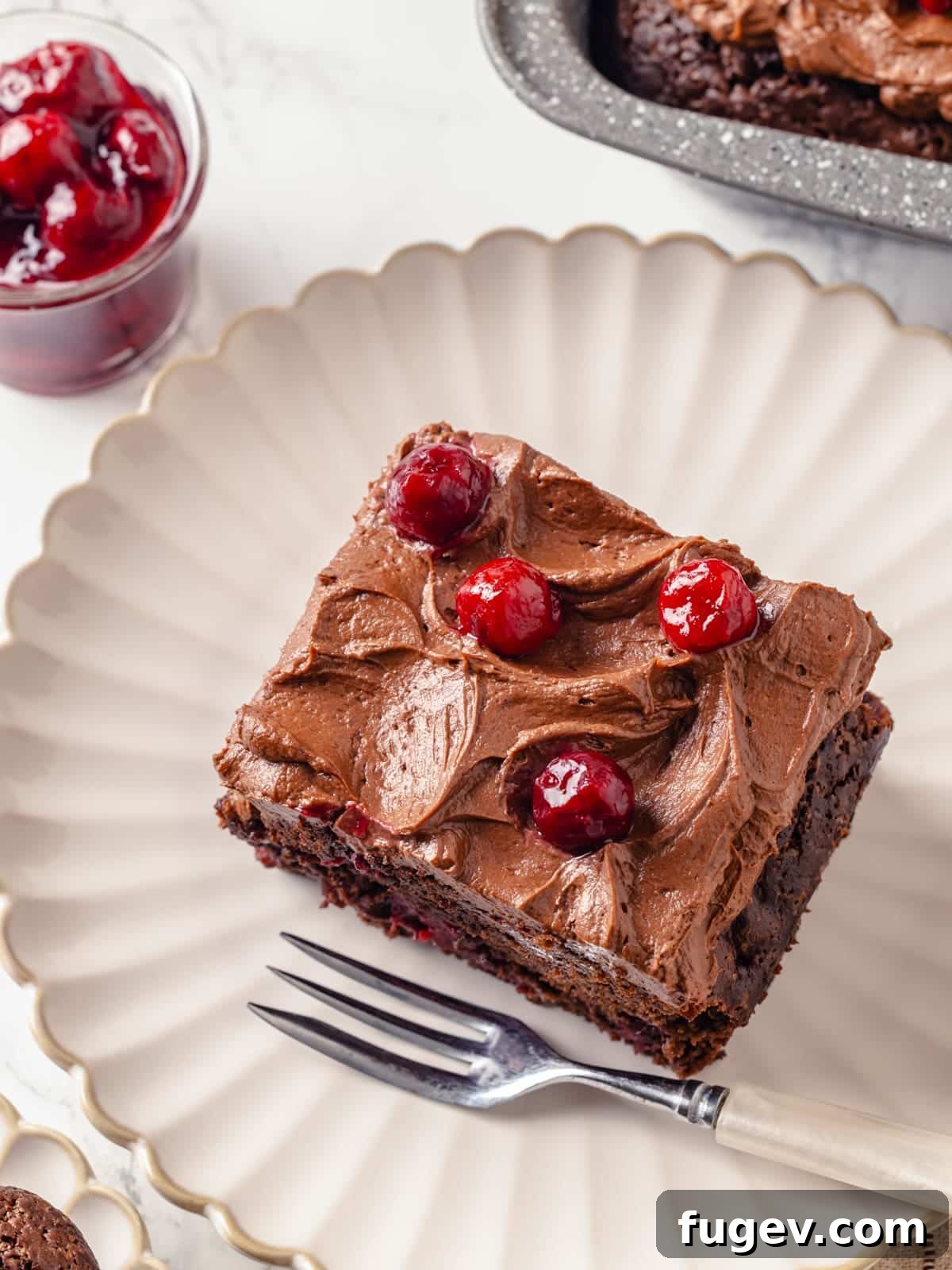 Velvet Chocolate Cherry Indulgence 21 A perfectly portioned chocolate cake slice, elegantly plated and ready to be savored.