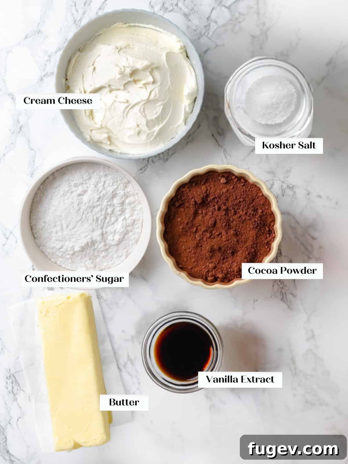 Decadent Chocolate Cream Cheese Dream 4 Carefully arranged baking ingredients, including cream cheese, butter, cocoa powder, and sugar, ready for making chocolate cream cheese frosting.
