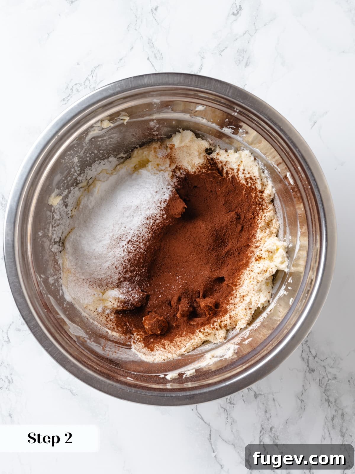 Decadent Chocolate Cream Cheese Dream 7 Sifted dry ingredients, including cocoa powder and powdered sugar, neatly prepared for mixing into chocolate cream cheese frosting.
