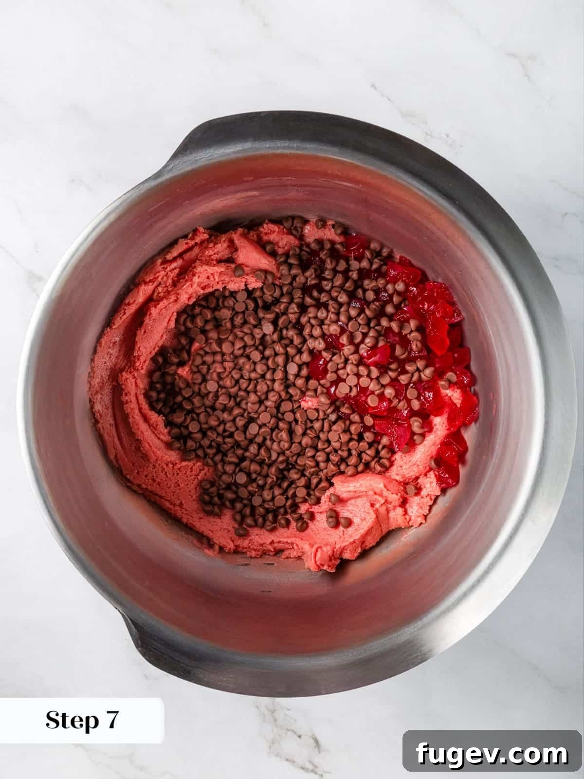 Luscious Cherry Chocolate Chip Cookies 13 Finely chopped maraschino cherries and mini chocolate chips being added to the prepared cookie dough.