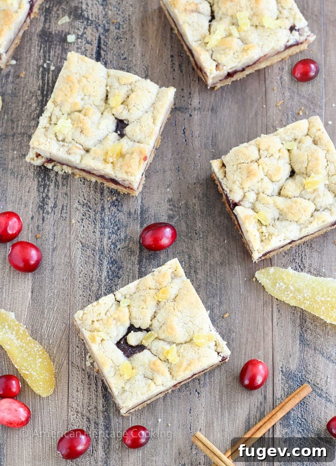 Spiced Cranberry Crumble Bars 6 A festive platter showcasing an array of holiday desserts including Cranberry Cinnamon Jam Bars, perfect for sharing and gifting.
