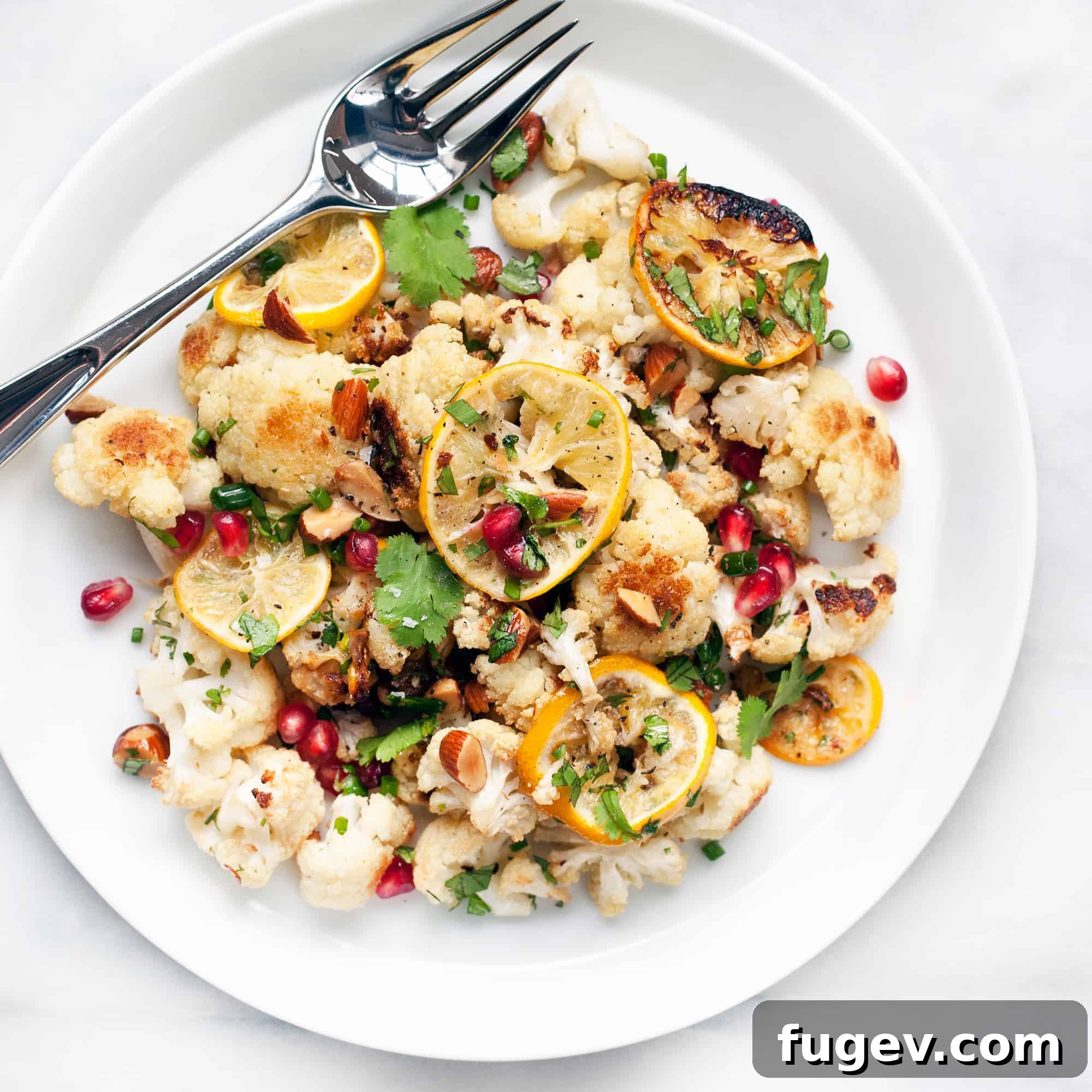 Bright Meyer Lemon Roasted Cauliflower Salad 2 Roasted Cauliflower Meyer Lemon Salad - A vibrant winter dish with pomegranate and fresh herbs.
