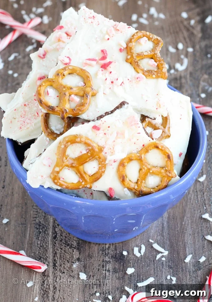 Crunchy Coconut Peppermint Pretzel Bark 2 This easy Coconut Peppermint Pretzel Bark is a minty mix of white and dark chocolate with candy cane "snow", salty pretzels and a hint of coconut! You will love the holiday mint flavor!