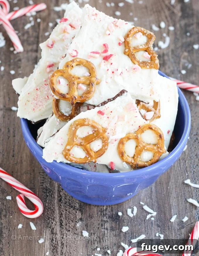 Crunchy Coconut Peppermint Pretzel Bark 4 This easy Coconut Peppermint Pretzel Bark is a minty mix of white and dark chocolate with candy cane "snow", salty pretzels and a hint of coconut! You will love the holiday mint flavor!