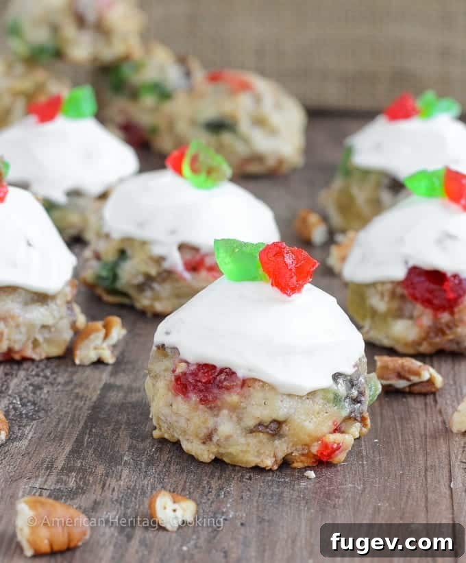 Decadent Fruitcake Cookies with Boozy Cream Cheese Frosting 5 Fruitcake Cookies are chewy sugar cookies stuffed full of candied fruits, raisins and toasted pecans for a unique twist on the classic Christmas fruitcake! Topped with a brandy cream cheese frosting, these little cookies are irresistible!