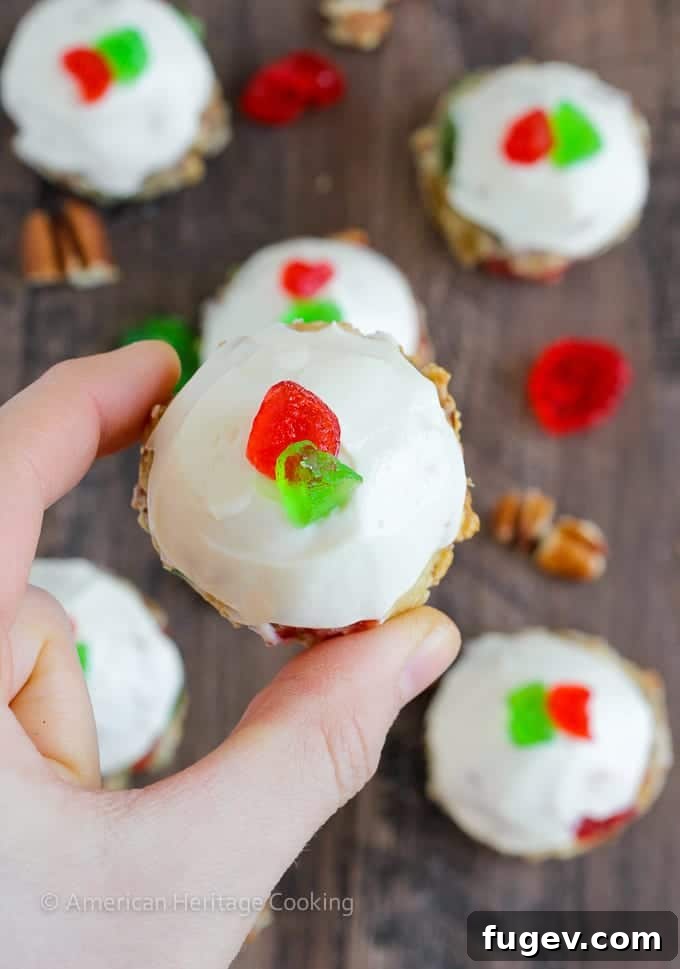 Decadent Fruitcake Cookies with Boozy Cream Cheese Frosting 6 Fruitcake Cookies are chewy sugar cookies stuffed full of candied fruits, raisins and toasted pecans for a unique twist on the classic Christmas fruitcake! Topped with a brandy cream cheese frosting, these little cookies are irresistible!