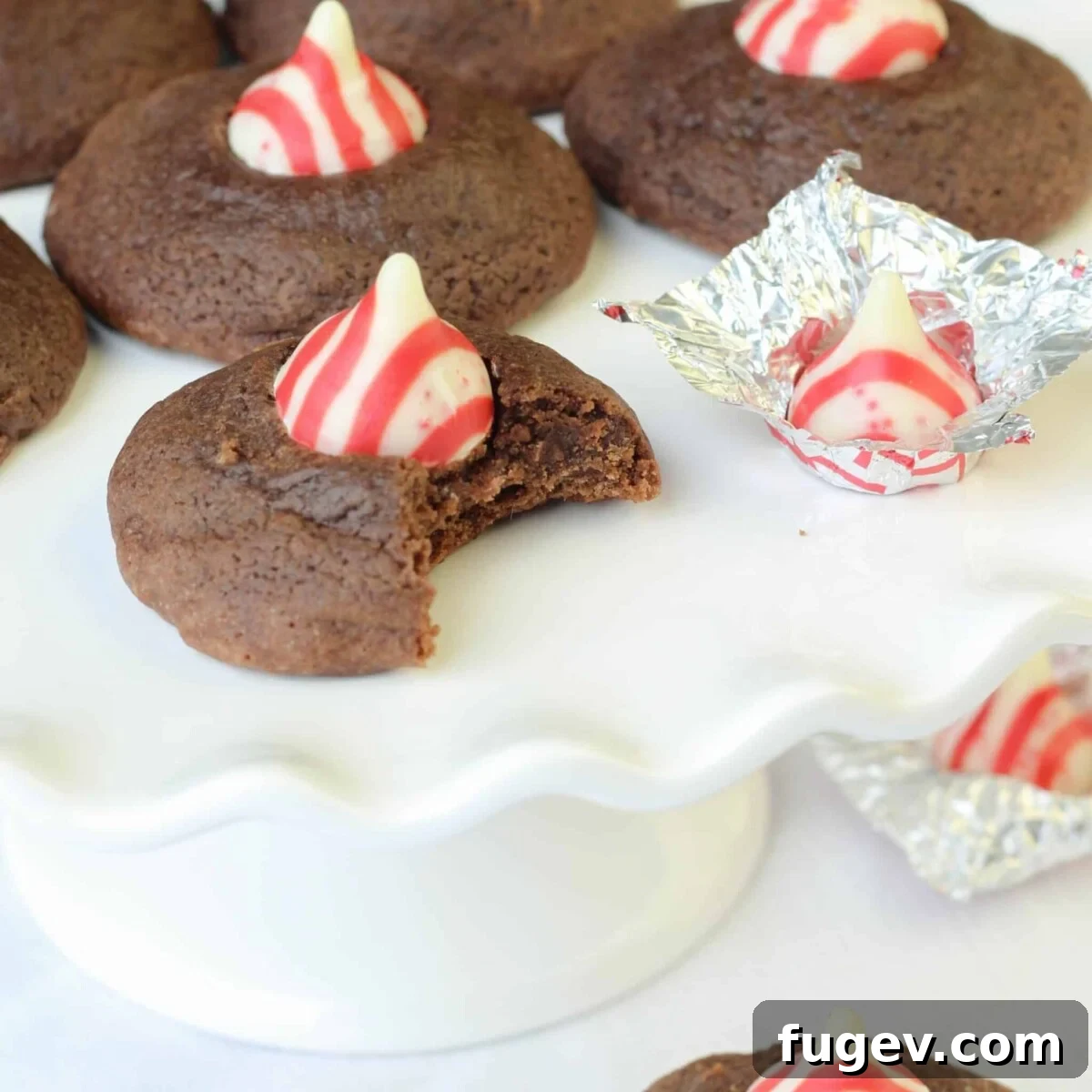 16 Festive Chocolate Christmas Cookies 16 A delicious Double Chocolate Peppermint Kiss Cookie, bitten to reveal its rich, festive filling.