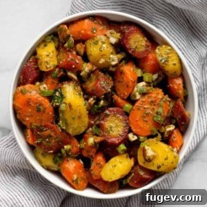 Moroccan carrot salad with parsley-cilantro dressing in a bowl.